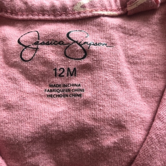 Pink jumpsuit with white star designs and fringe - Picture 3 of 8